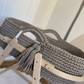 Hooded Basket with wooden stand.